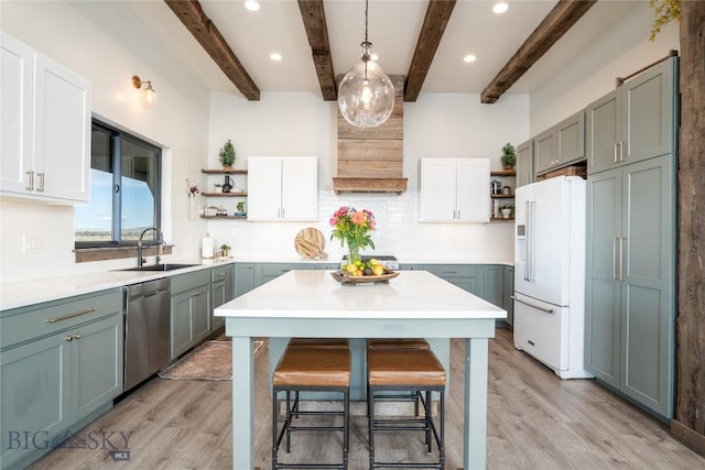 18287 Haasakker Rd, Three Forks, MT 59752 - kitchen with open shelves, high end white refrigerator, dishwasher, beam ceiling, and tasteful backsplash