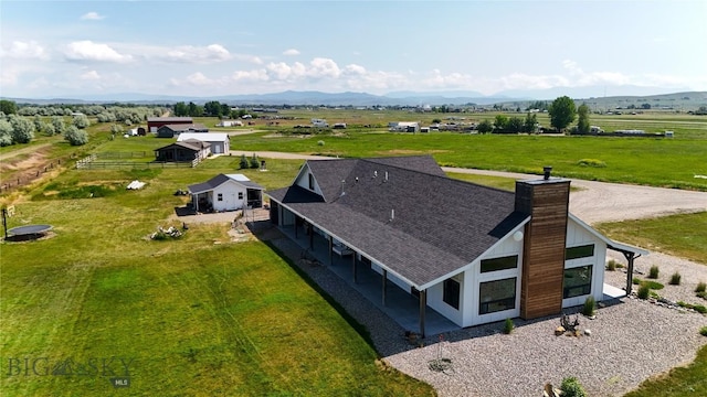 18287 Haasakker Rd, Three Forks, MT 59752 - overview of rural landscape with a mountain backdrop