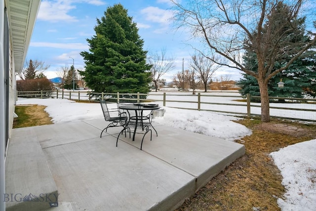 view of patio featuring outdoor dining space and a fenced backyard