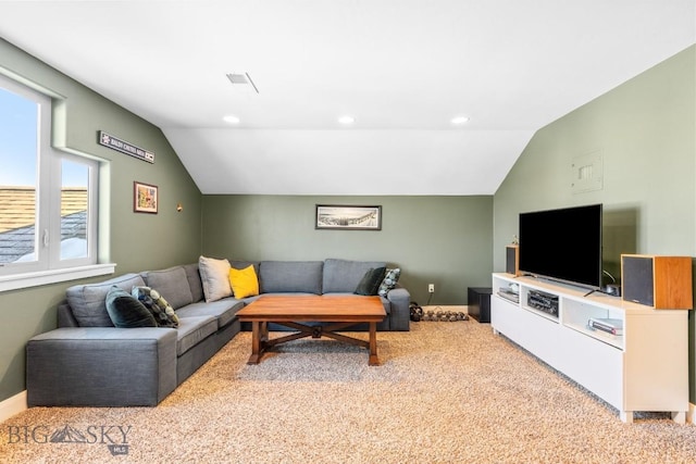 living room featuring lofted ceiling, recessed lighting, and light carpet