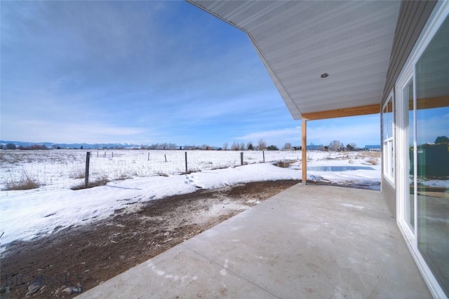 view of snow covered patio