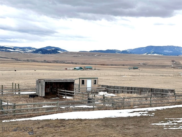 mountain view featuring a rural view