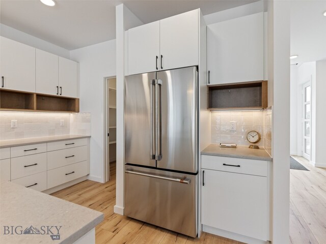 2824 S 30th Ave, Bozeman, MT 59718 - kitchen featuring high quality fridge, open shelves, tasteful backsplash, white cabinets, and recessed lighting