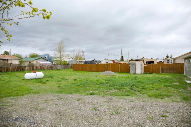305 Lathrop St W, Clyde Park, MT 59018 - fenced backyard featuring a shed and an outbuilding
