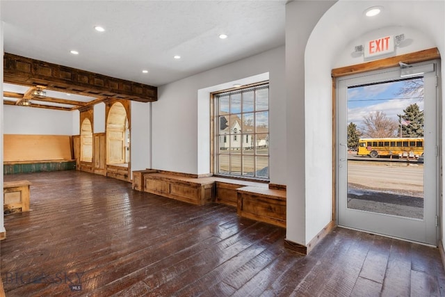 foyer entrance featuring recessed lighting, baseboards, and dark wood-style floors