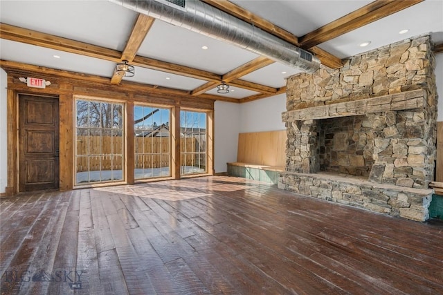 8005 Churchill Rd, Churchill, MT 59741 - unfurnished living room featuring a stone fireplace, hardwood / wood-style flooring, beamed ceiling, and coffered ceiling