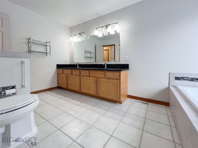 full bathroom with a bath, visible vents, a sink, tile patterned flooring, and toilet