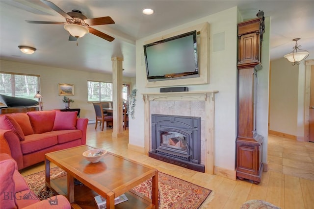 living room with light wood-style flooring, recessed lighting, decorative columns, baseboards, and ceiling fan