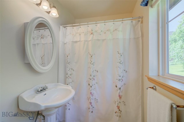 full bath featuring a sink