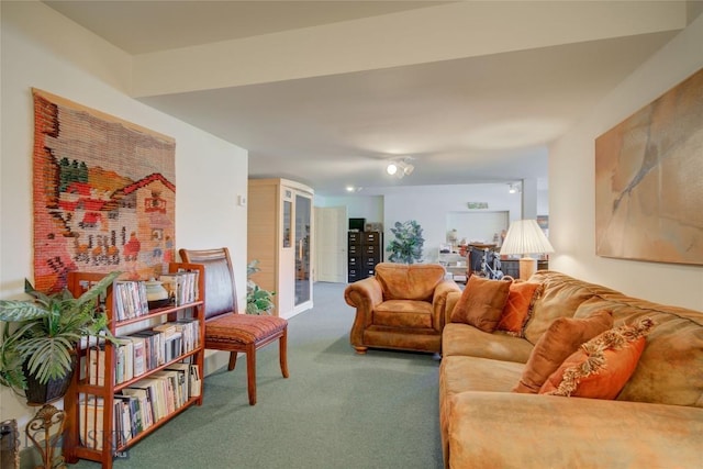 living area featuring carpet floors