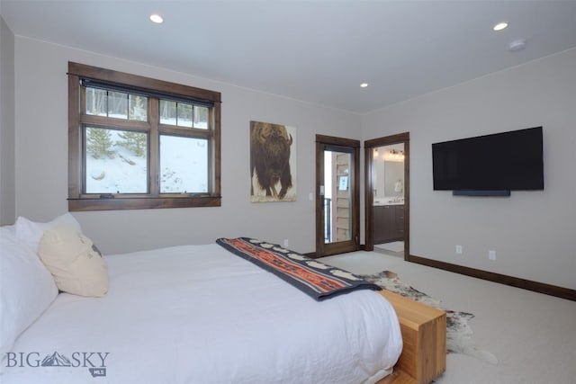 carpeted bedroom featuring recessed lighting, baseboards, and ensuite bathroom