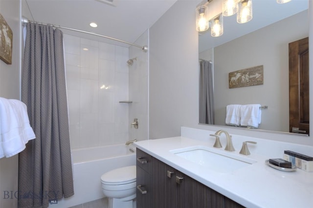 full bath with toilet, vanity, and shower / tub combo with curtain