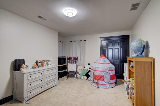 game room with visible vents and carpet floors