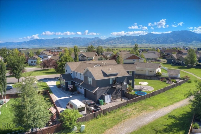 drone / aerial view with a mountain view and a residential view