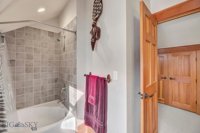 bathroom featuring recessed lighting and shower / bath combination with curtain