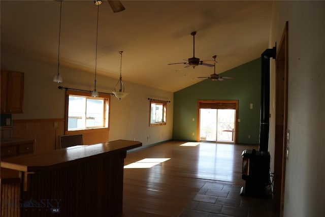 kitchen with high vaulted ceiling, dark wood-style floors, a wealth of natural light, and ceiling fan