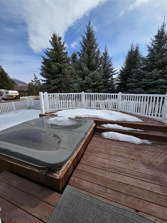 3004 Green Cir, Butte, MT 59701 - wooden deck featuring a covered hot tub