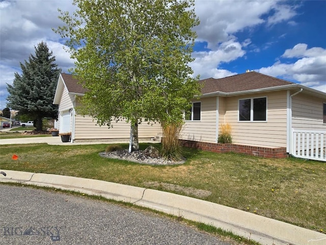 3004 Green Cir, Butte, MT 59701 - view of front of property featuring a front lawn and an attached garage