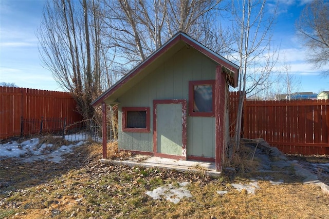 view of shed featuring a fenced backyard