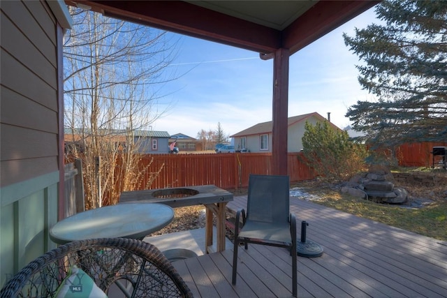 deck featuring a fenced backyard