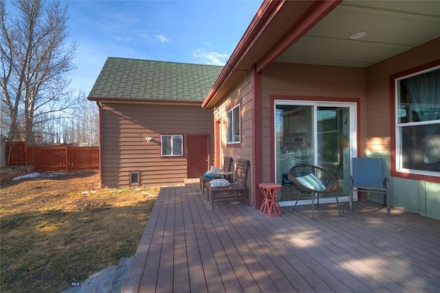 wooden deck featuring fence