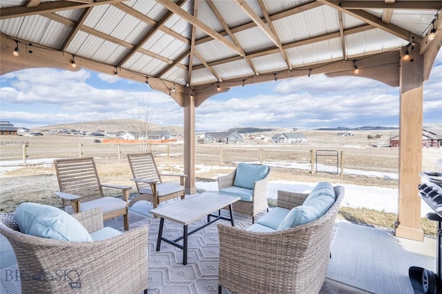 view of patio featuring a gazebo and outdoor lounge area