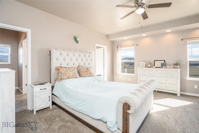 bedroom featuring recessed lighting, baseboards, light colored carpet, and a ceiling fan