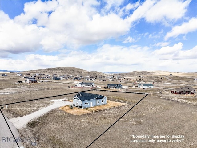 bird's eye view with a mountain view