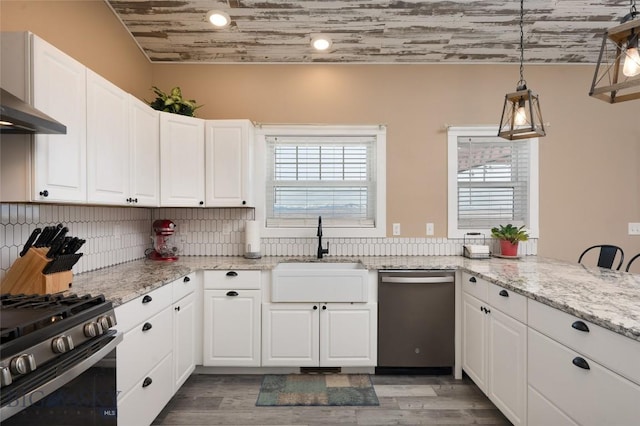 kitchen featuring a sink, range with gas cooktop, dishwasher, and white cabinets