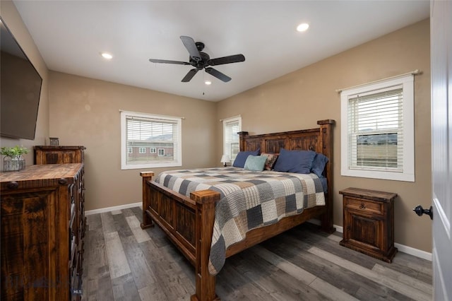 bedroom featuring recessed lighting, baseboards, wood finished floors, and a ceiling fan