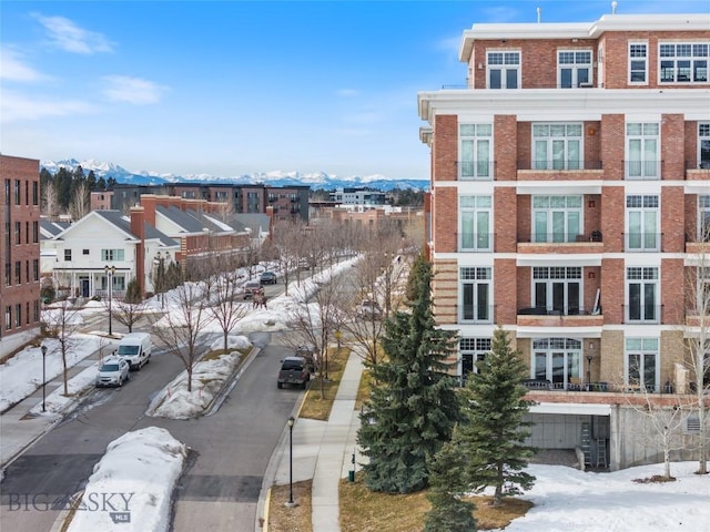 city view featuring a mountain view and a residential view