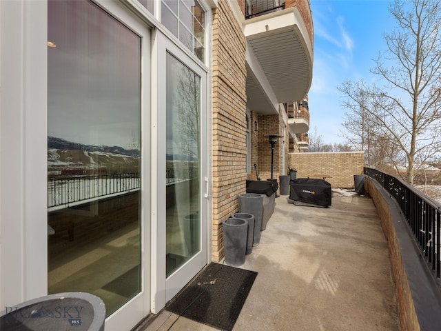 view of patio / terrace with a balcony