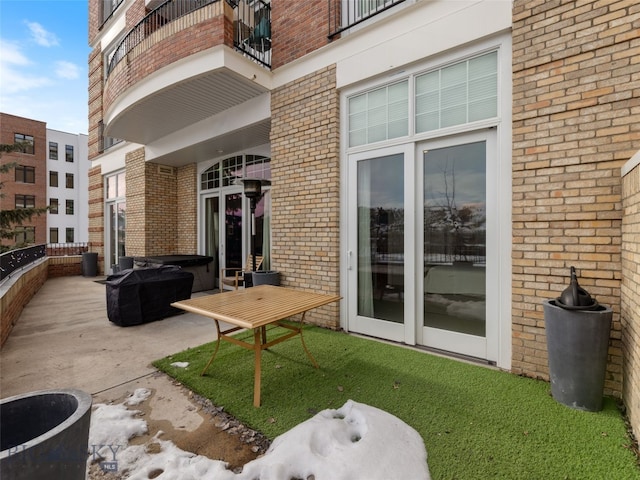 view of patio / terrace featuring a balcony