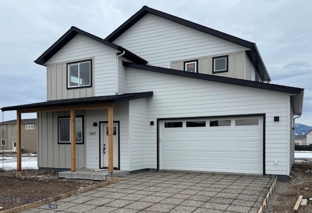 view of front of home featuring a garage and board and batten siding