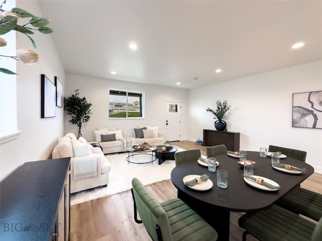 dining area with recessed lighting and light wood-type flooring