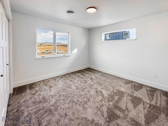 interior space featuring visible vents and baseboards