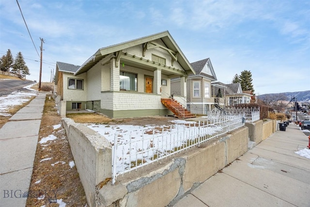 view of front of home with fence