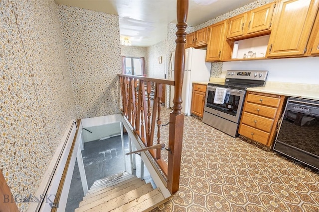 kitchen with open shelves, black dishwasher, freestanding refrigerator, stainless steel electric range, and light countertops