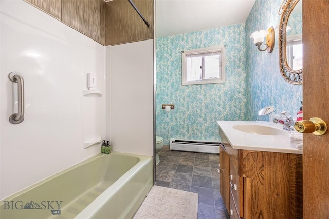 full bathroom with wallpapered walls, a baseboard heating unit, toilet, vanity, and  shower combination