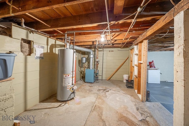 unfinished below grade area featuring gas water heater and a heating unit