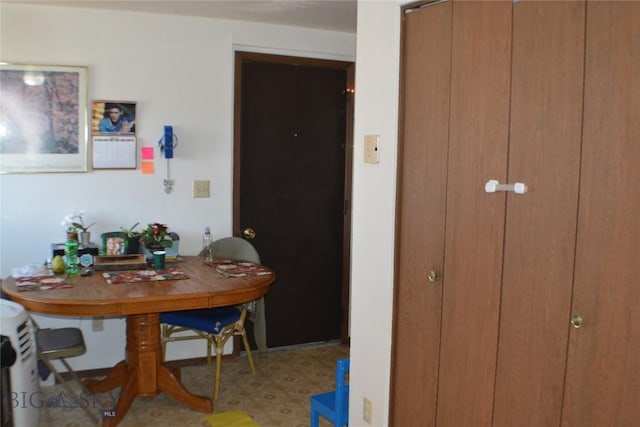 dining area featuring tile patterned floors