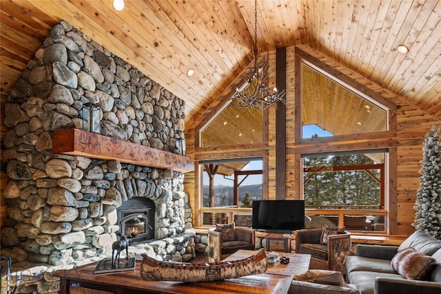 unfurnished living room with high vaulted ceiling, wood ceiling, wood walls, and an inviting chandelier