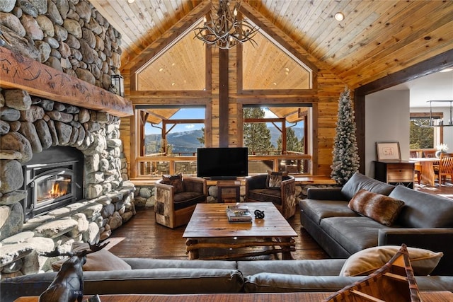 living area featuring wood finished floors, high vaulted ceiling, an inviting chandelier, wood walls, and wooden ceiling