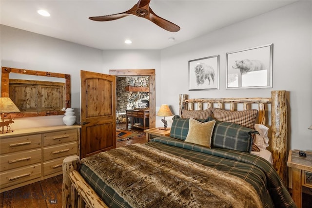 bedroom featuring dark wood finished floors, recessed lighting, and a ceiling fan