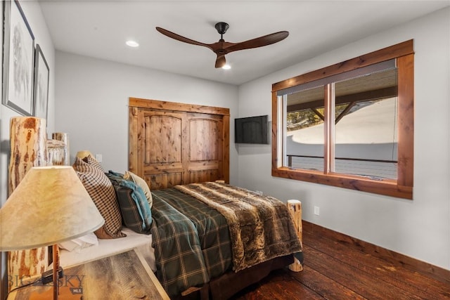 bedroom featuring recessed lighting, baseboards, wood-type flooring, and ceiling fan