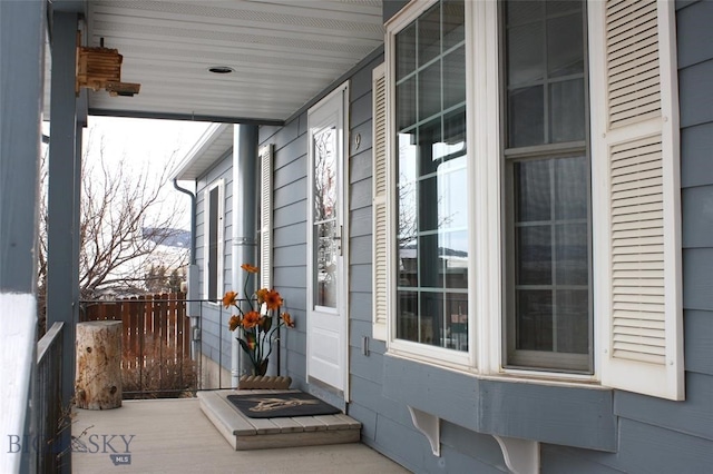 entrance to property with covered porch