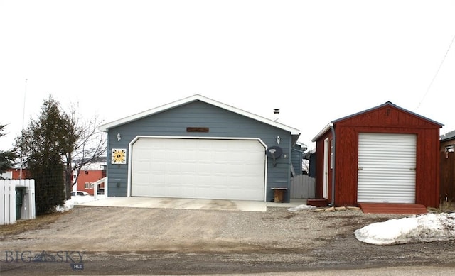 detached garage with fence