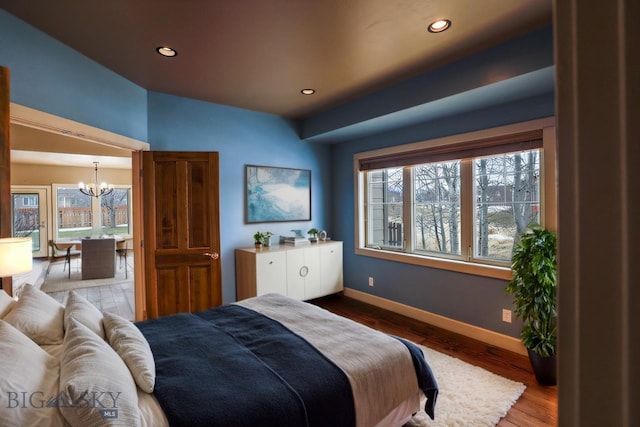 284 Annie Glade, Bozeman, MT 59718 - bedroom with a chandelier, baseboards, recessed lighting, and wood finished floors