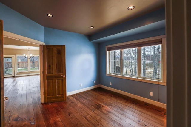 284 Annie Glade, Bozeman, MT 59718 - unfurnished room featuring a chandelier, dark wood finished floors, baseboards, and recessed lighting