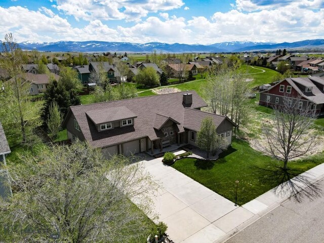 284 Annie Glade, Bozeman, MT 59718 - aerial view of residential area featuring a mountainous background